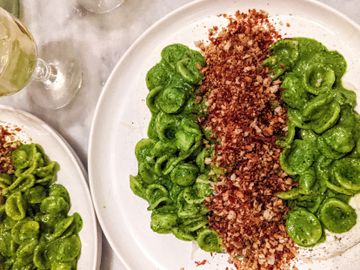 Orecchiette al pesto on whipped lemony ricotta with prosciutto chili breadcrumbs