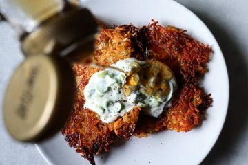 Kimchi potato fritters with scallion cream cheese and maple syrup